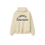 Fear of God Essentials Blue Jays Sport Hoodie in Oat | Luxury Shoes 