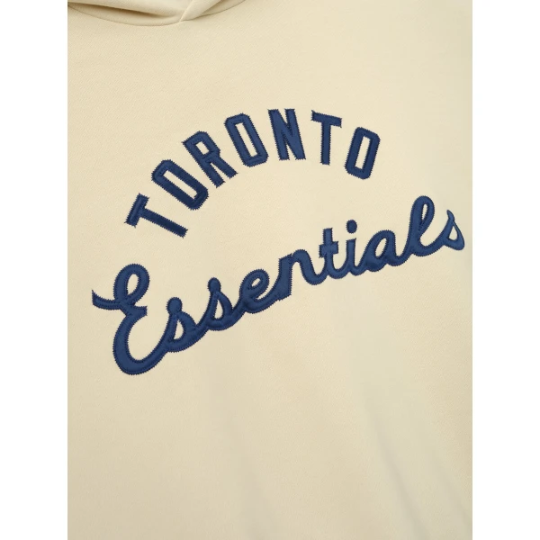 Fear of God Essentials Blue Jays Sport Hoodie in Oat | Sweatshirts | Luxury Shoes 