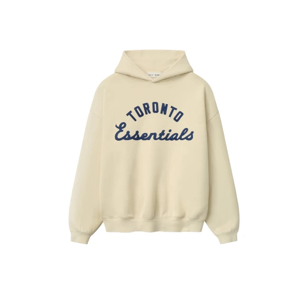 Fear of God Essentials Blue Jays Sport Hoodie in Oat | Luxury Shoes 