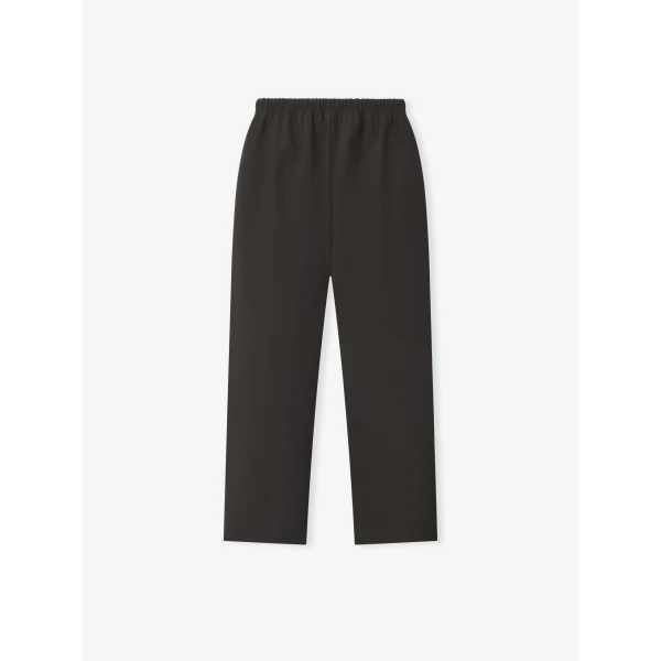 Fear of God Essentials Bonded Nylon Signature Classic Track Pant in Ink Black | Pants | Luxury Shoes 