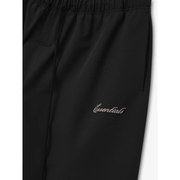 Fear of God Essentials Bonded Nylon Signature Relaxed Short with Slit in Black | Shorts | Luxury Shoes 