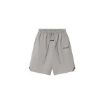 Fear of God Essentials Bonded Nylon Signature Relaxed Short with Slit in Stone | Luxury Shoes 