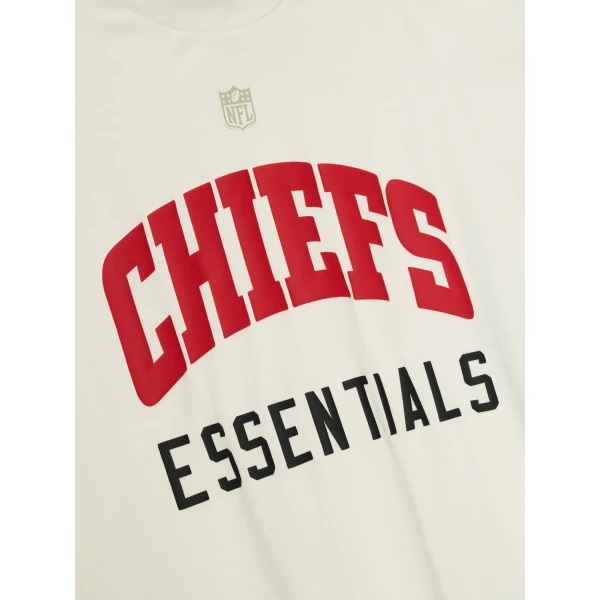 Fear of God Essentials Chiefs 90s 3/4 Sleeve Football Tee in Cream White | T-shirts & vests | Luxury Shoes 