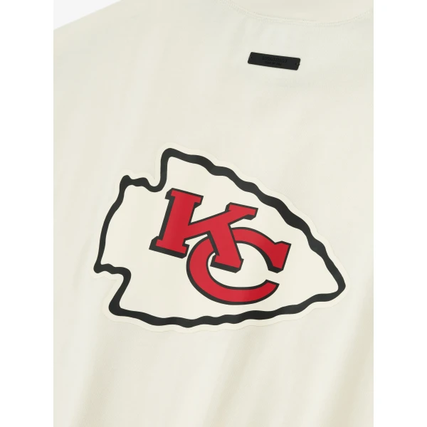 Fear of God Essentials Chiefs 90s 3/4 Sleeve Football Tee in Cream White | T-shirts & vests | Luxury Shoes 