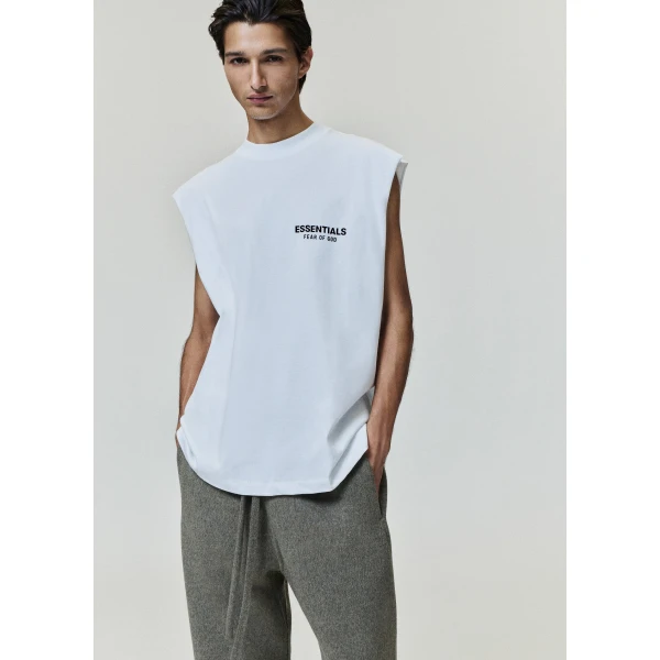 Fear of God Essentials Classic Cut-Off in Bright White | T-shirts & vests | Luxury Shoes 