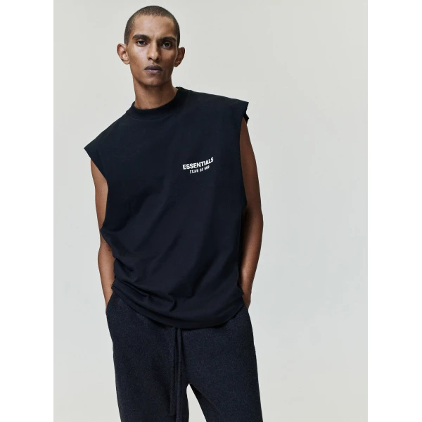 Fear of God Essentials Classic Cut-Off in Vintage Black | T-shirts & vests | Luxury Shoes 
