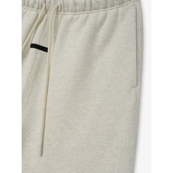 Fear of God Essentials Classic Fleece Sweatpant in Vanilla Heather | Pants | Luxury Shoes 
