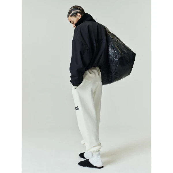 Fear of God Essentials Classic Fleece Sweatpant in Washed Ivory | Pants | Luxury Shoes 