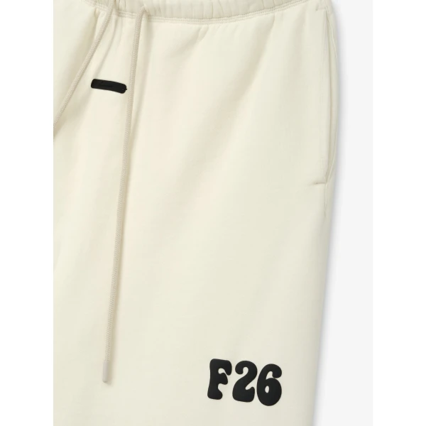 Fear of God Essentials Classic Fleece Sweatpant in Washed Ivory | Pants | Luxury Shoes 