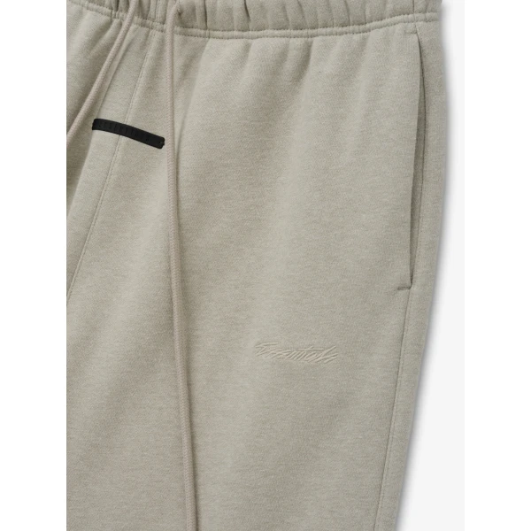 Fear of God Essentials Classic Slouchy Sweatpant in Pyrite Heather | Pants | Luxury Shoes 