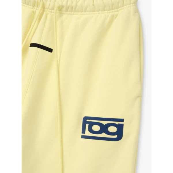 Fear of God Essentials Classic Slouchy Sweatpant in Washed Sulphur | Pants | Luxury Shoes 