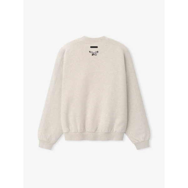 Fear of God Essentials Eagles 90s Relaxed Crewneck in Marble Heather | Sweatshirts | Luxury Shoes 