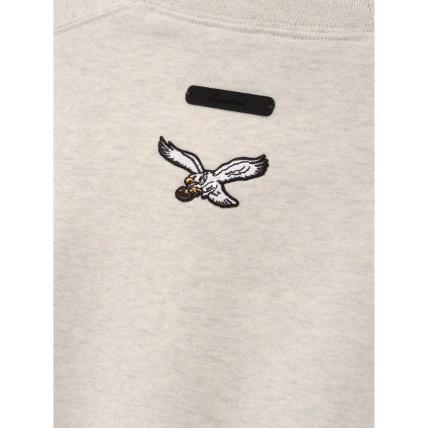 Fear of God Essentials Eagles 90s Relaxed Crewneck in Marble Heather | Sweatshirts | Luxury Shoes 