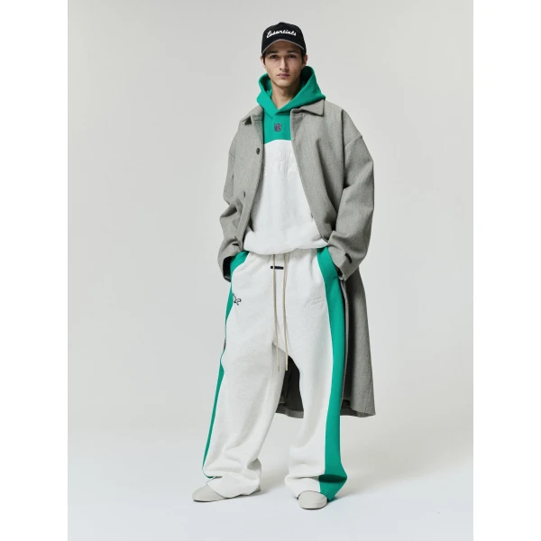 Fear of God Essentials Eagles 90s Relaxed Hoodie in Marble Heather | Sweatshirts | Luxury Shoes 