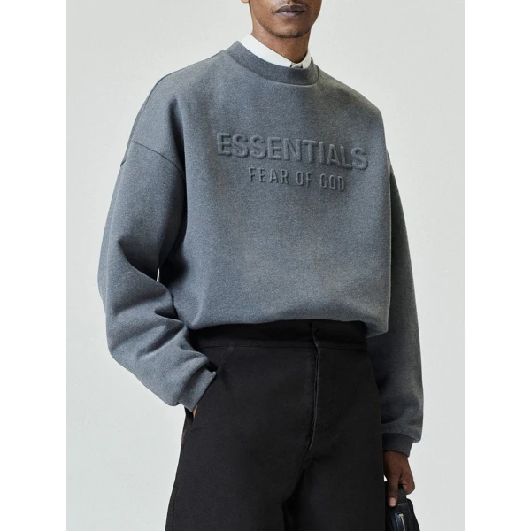 Fear of God Essentials Embossed 90s Relaxed Crewneck in Ash Heather | Sweatshirts | Luxury Shoes 