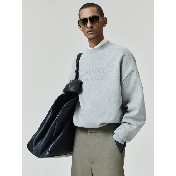 Fear of God Essentials Embossed 90s Relaxed Crewneck in Warm Heather | Sweatshirts | Luxury Shoes 