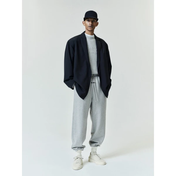 Fear of God Essentials Embossed 90s Relaxed Crewneck in Warm Heather | Sweatshirts | Luxury Shoes 