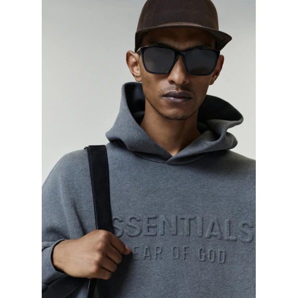 Fear of God Essentials Embossed 90s Relaxed Hoodie in Ash Heather | Sweatshirts | Luxury Shoes 