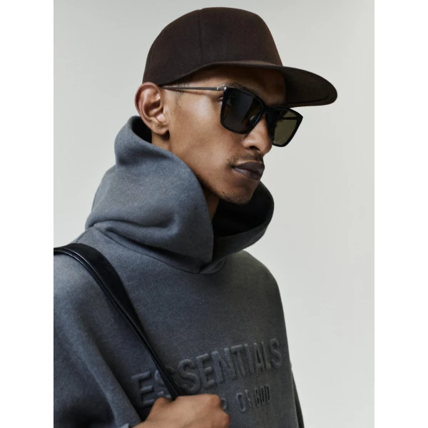 Fear of God Essentials Embossed 90s Relaxed Hoodie in Ash Heather | Sweatshirts | Luxury Shoes 