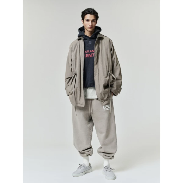 Fear of God Essentials Falcons 90s Relaxed Hoodie in Iron Grey Heather | Sweatshirts | Luxury Shoes 