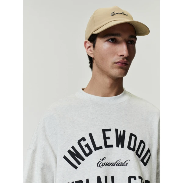 Fear of God Essentials Inglewood x All Star Weekend 2026 90s Tee in Oatmeal Heather | T-shirts & vests | Luxury Shoes 
