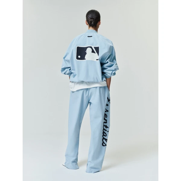 Fear of God Essentials MLB Full Zip Bomber in Stone Blue | Men Jackets | Luxury Shoes 