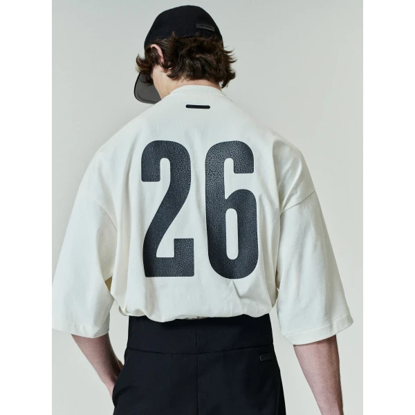 Fear of God Essentials Merch Tee Boxy Fit in Ivory | T-shirts & vests | Luxury Shoes 