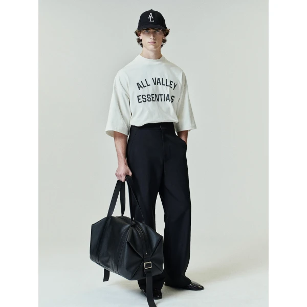 Fear of God Essentials Merch Tee Boxy Fit in Ivory | T-shirts & vests | Luxury Shoes 