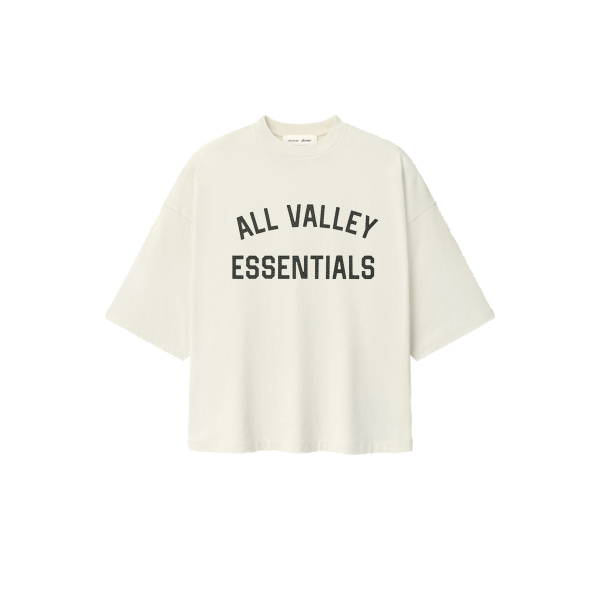 Fear of God Essentials Merch Tee Boxy Fit in Ivory | Luxury Shoes 