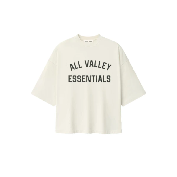 Fear of God Essentials Merch Tee Boxy Fit in Ivory | Luxury Shoes 