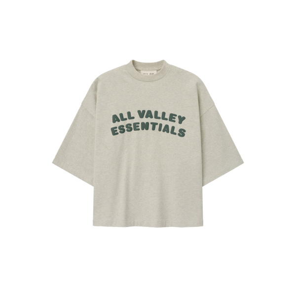 Fear of God Essentials Merch Tee Boxy Fit in Vanilla Heather | Luxury Shoes 