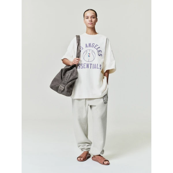Fear of God Essentials NBA x Barkley Hendricks Classic Sweatpant in Heather Stone | Pants | Luxury Shoes 