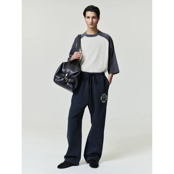 Fear of God Essentials NBA x Barkley Hendricks Tearaway Sweatpant in Faded Black | Pants | Luxury Shoes 