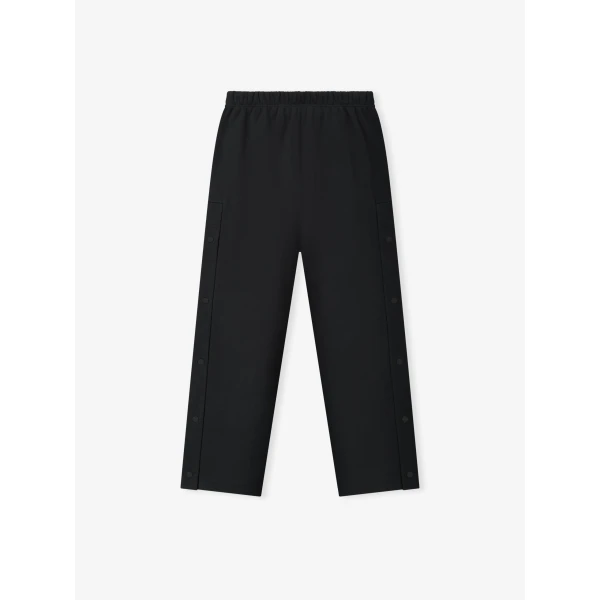 Fear of God Essentials NBA x Barkley Hendricks Tearaway Sweatpant in Faded Black | Pants | Luxury Shoes 