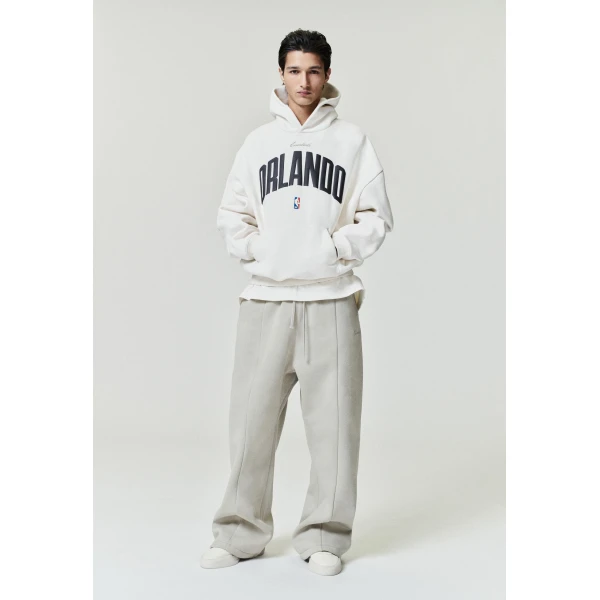 Fear of God Essentials Orlando Magic 90s Hoodie in Cream White | Sweatshirts | Luxury Shoes 