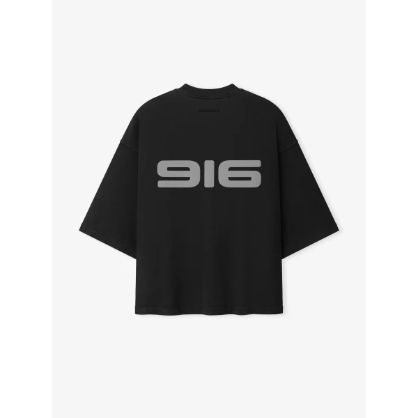 Fear of God Essentials Racing Merch Tee in Washed Vintage Black | T-shirts & vests | Luxury Shoes 