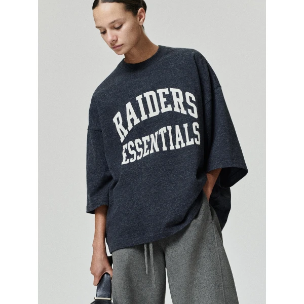 Fear of God Essentials Raiders Merch Tee in Iron Grey Heather | T-shirts & vests | Luxury Shoes 