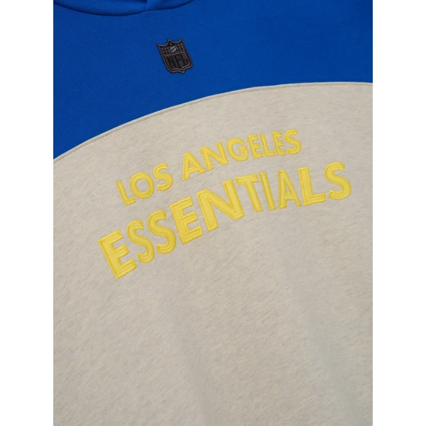 Fear of God Essentials Rams 90s Relaxed Hoodie in Vanilla Heather | Sweatshirts | Luxury Shoes 