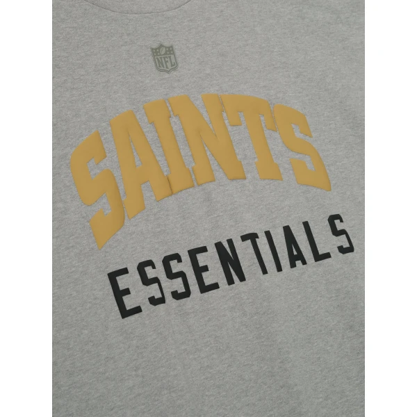 Fear of God Essentials Saints 90s 3/4 Sleeve Football Tee in Concrete Heather | T-shirts & vests | Luxury Shoes 