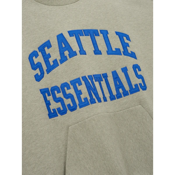 Fear of God Essentials Seahawks 90s Relaxed Crewneck in Seal Heather | Sweatshirts | Luxury Shoes 