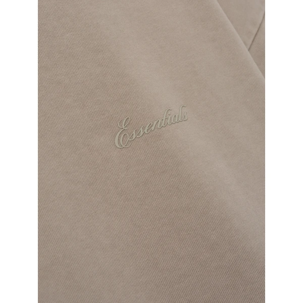 Fear of God Essentials Signature 90s Relaxed Long Sleeve Tee in Washed Stone | T-shirts & vests | Luxury Shoes 