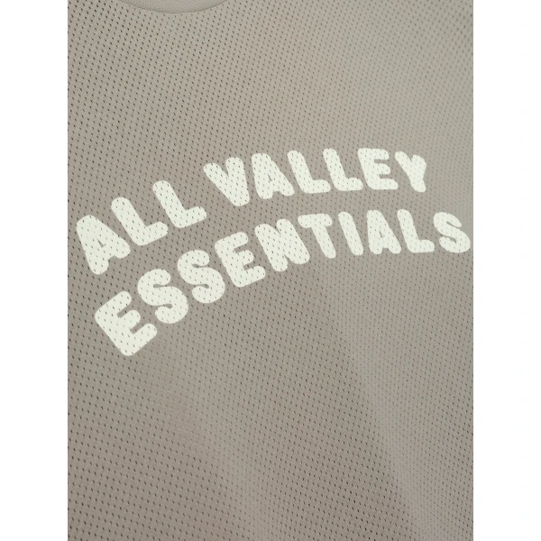 Fear of God Essentials Sport Mesh Merch Long Sleeve Tee in Seal | T-shirts & vests | Luxury Shoes 