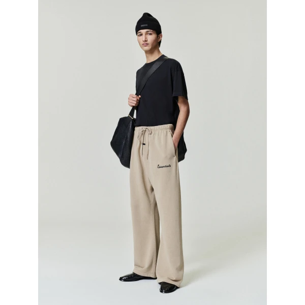 Fear of God Essentials Training Classic Flare Sweatpant in Faded Dune | Pants | Luxury Shoes 
