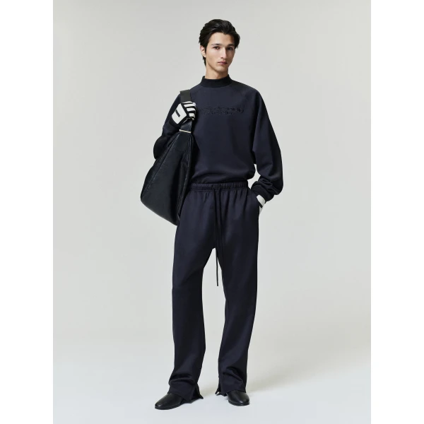 Fear of God Essentials Tricot Classic Trackpant in Black | Pants | Luxury Shoes 