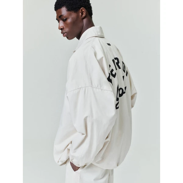 Fear of God Garment Dyed Cotton Windbreaker in Natural | Men Jackets | Luxury Shoes 