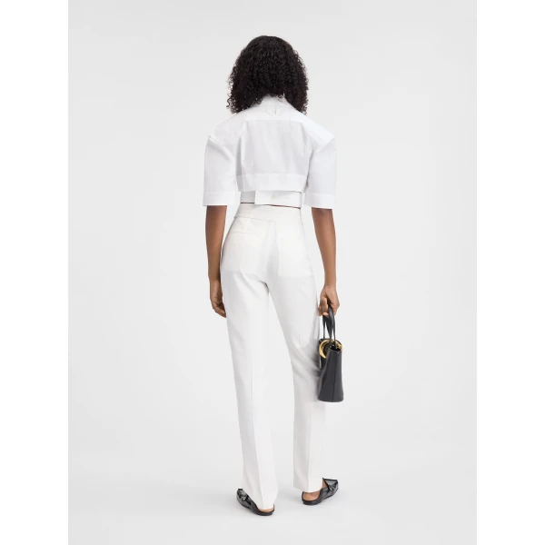 white Jacquemus trousers