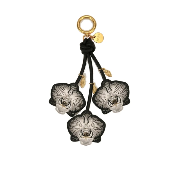 JW PEI Orchid Bag Charm in Black | Bag Charms | Luxury Shoes 
