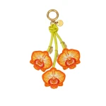 JW PEI Orchid Bag Charm in Bright Orange | Bag Charms | Luxury Shoes 