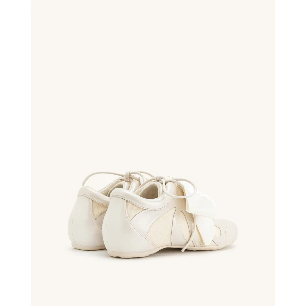 JW PEI Rosie Bow Tie Low Top Sneakers in White | Sneakers | Luxury Shoes 