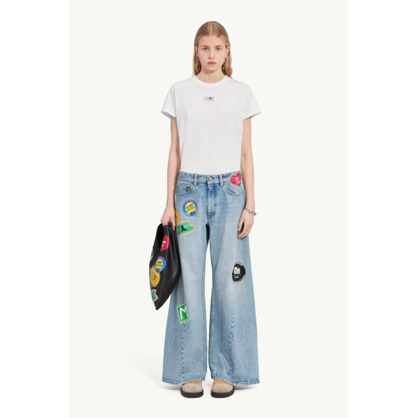 MM6 Maison Margiela Sticker-Print Wide-Leg Jeans in Blue, view 2 | Denim | Luxury Shoes 